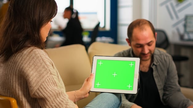 A person using a tablet to take a survey in a comfortable setting. The screen displays a survey question, and the person is focused on providing a thoughtful answer.