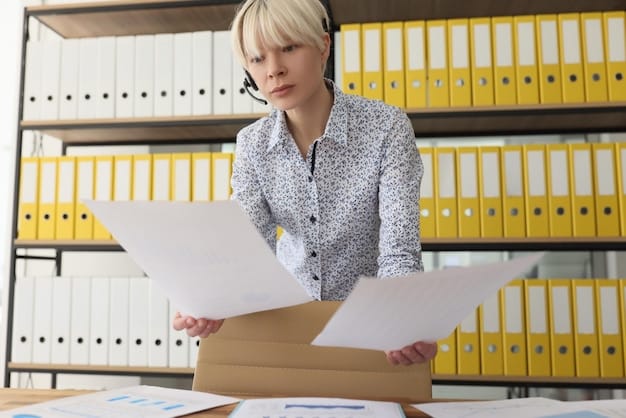 A person sitting at a desk, reviewing a stack of business insurance policies and comparing coverage options on a tablet or laptop. The setting highlights the importance of understanding and choosing appropriate insurance for gig workers.