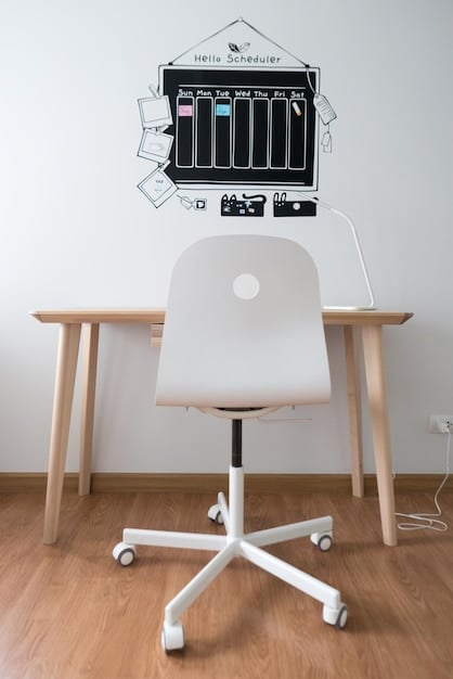 An ergonomic workspace setup with a comfortable chair, adjustable monitor, and organized desk accessories like pen holders and file organizers.
