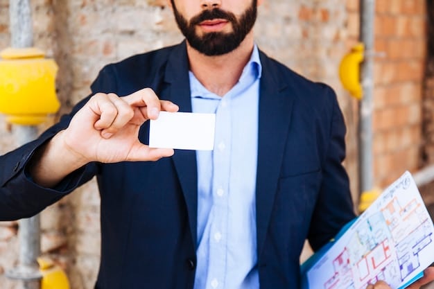 A gig worker confidently handing a business card to a potential client at an industry conference. The scene displays a professional exchange aimed at building new business relationships.