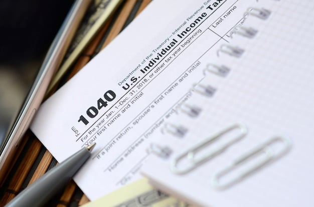 A close-up shot of a U.S. tax form 1040, highlighting sections related to rental income and deductions.