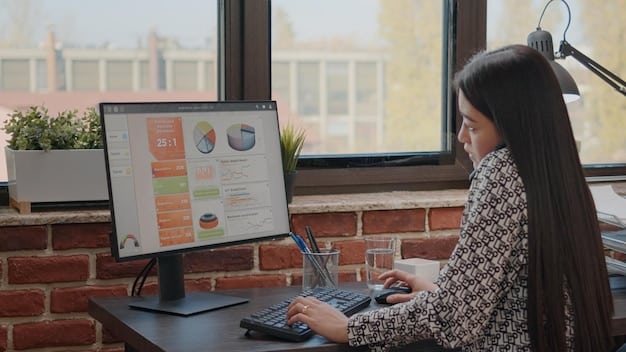 A person sitting at a desk, analyzing data on a computer screen. The screen shows graphs and charts related to video performance metrics like views, engagement, and conversion rates. The image focuses on data-driven decision-making to optimize video marketing strategy.