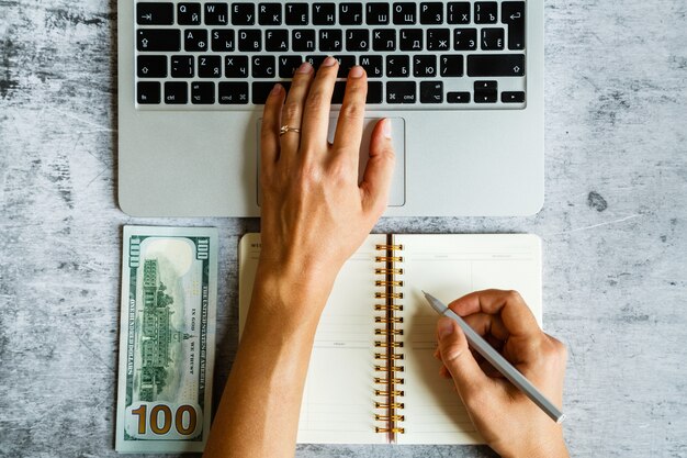 A close-up of hands exchanging money, representing payment for freelance writing services, reinforcing the 'How to Make Money Online with Freelance Writing: A Beginner's Guide' theme.