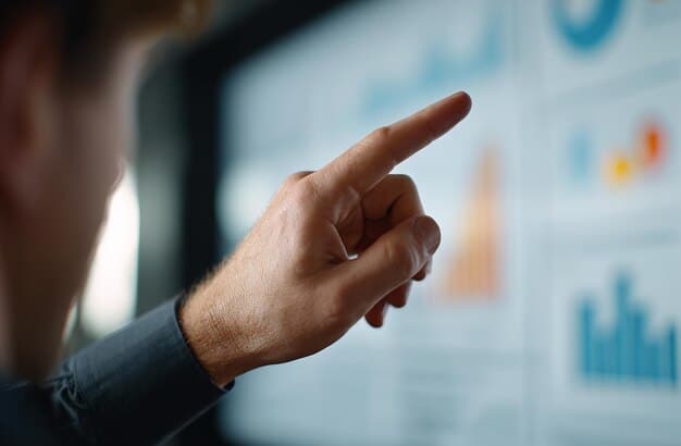 A close-up shot of a person's hand pointing to a specific data point on a digital dashboard, highlighting the importance of focusing on key metrics within the context of 'The Ultimate Guide to Digital Marketing Analytics: Track, Measure, and Optimize for a 12% Improvement'.